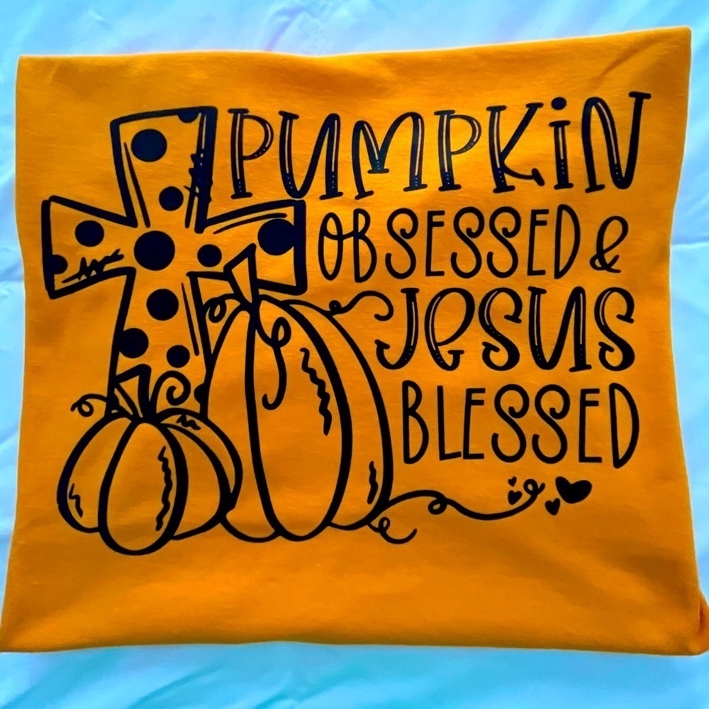 Orange Tee “Pumpkin Obsessed and Jesus Blessed” Size M